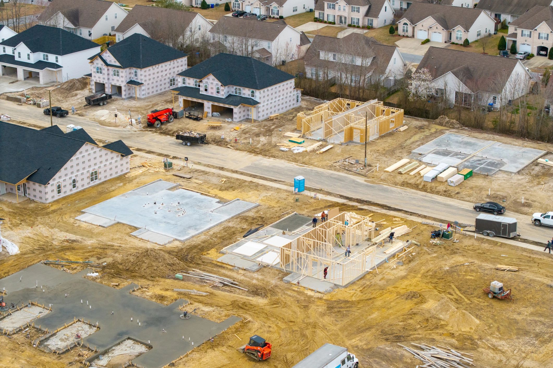 Building development under construction representing modular delivery