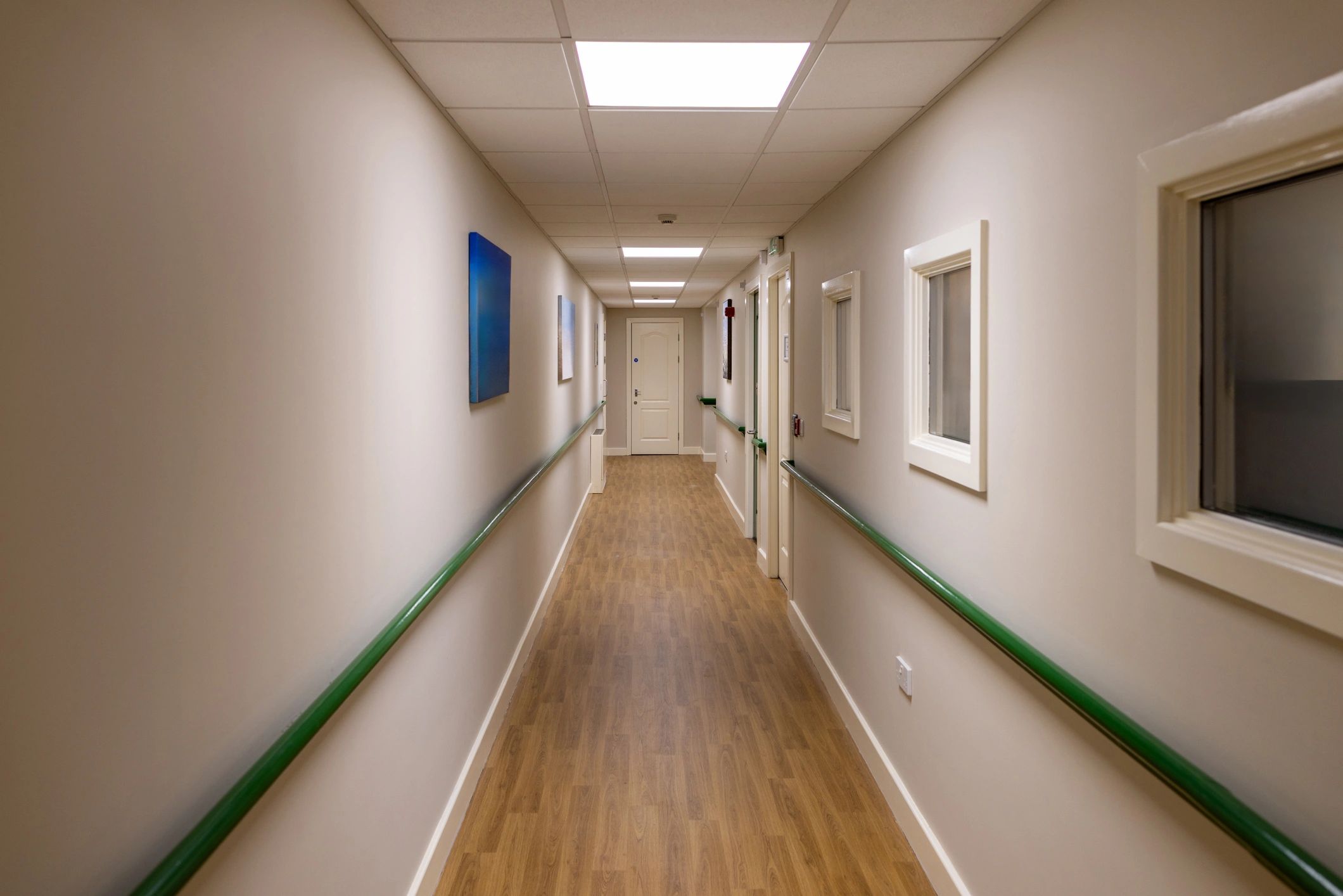 Clean, well-lit healthcare corridor interior